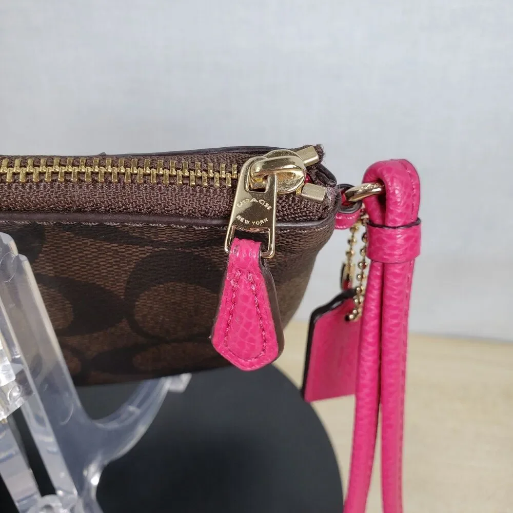 COACH Corner Zip Wristlet In Dark Brown Signature Leather w/ Hot Pink Stripe